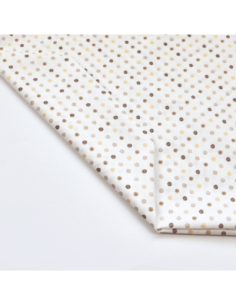 Tela blanca con estampado de puntitos de colores